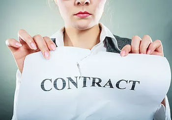 woman ripping up contract 