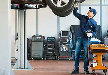 mechanic under car 