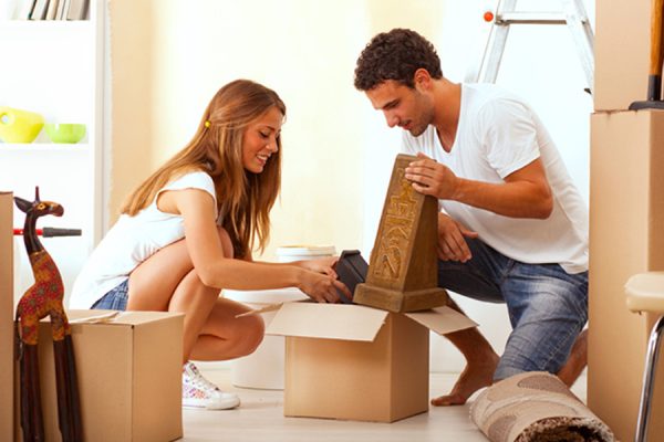 Man and Woman unpacking