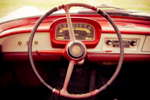 80s vehicle dashboard and steering wheel